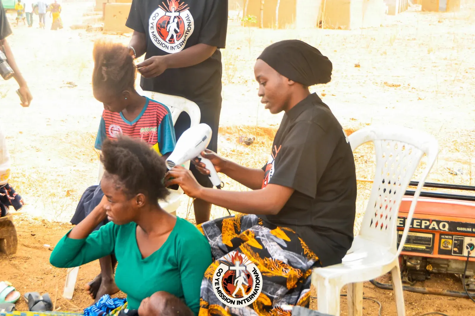 People celebrating at an outreach